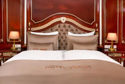 Ein Bett oder Betten in einem Zimmer der Unterkunft Hotel Unique Dortmund Hauptbahnhof