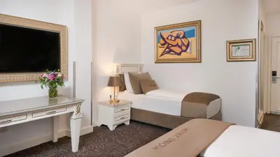 Ein Bett oder Betten in einem Zimmer der Unterkunft Hotel Unique Dortmund Hauptbahnhof