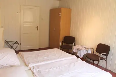 Ein Bett oder Betten in einem Zimmer der Unterkunft TM Apart Hotel Essen