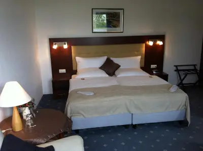 Ein Bett oder Betten in einem Zimmer der Unterkunft Hotel Abalone