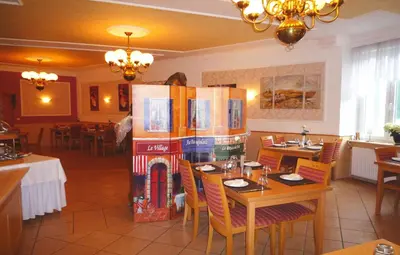 Ein Restaurant oder anderes Speiselokal in der Unterkunft Hotel Abalone