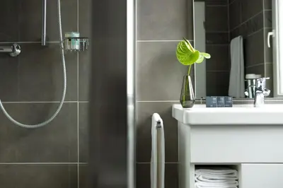 Ein Badezimmer in der Unterkunft The Grey Design Hotel