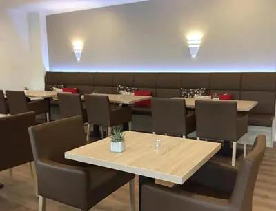 Ein Sitzbereich in der Unterkunft Hotel Am Quellberg