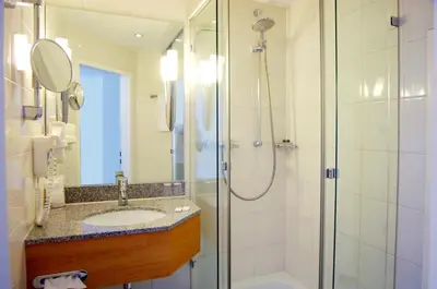 Ein Badezimmer in der Unterkunft Parkhaus Hügel