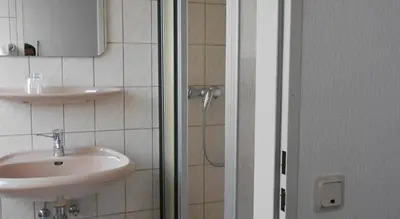 Ein Badezimmer in der Unterkunft Hotel Specht