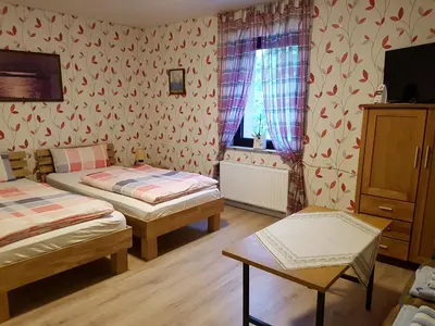 Ein Bett oder Betten in einem Zimmer der Unterkunft Landgasthof Schänzer