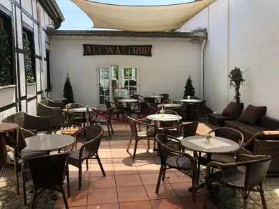 Ein Sitzbereich in der Unterkunft Burbaums Restaurant Hotel