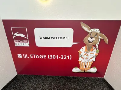 Ein Zertifikat, Auszeichnung, Logo oder anderes Dokument, das in der Unterkunft bon marché hôtel Bochum ausgestellt ist