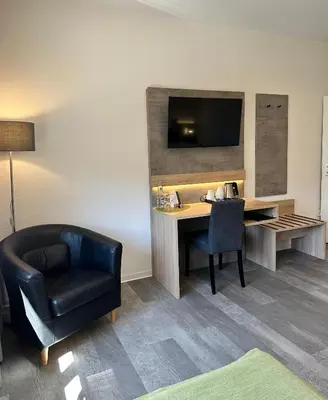 Ein Sitzbereich in der Unterkunft an Hotel GmbH