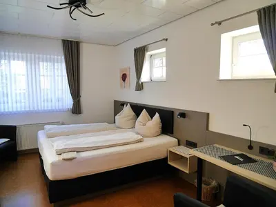 Ein Bett oder Betten in einem Zimmer der Unterkunft Gästezimmer Lammersmann