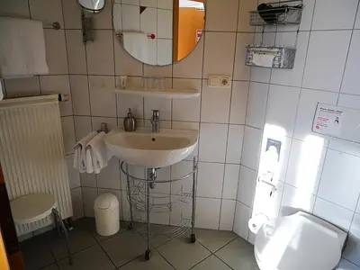 Ein Badezimmer in der Unterkunft Gästezimmer Lammersmann
