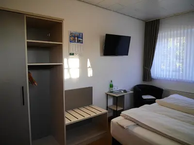 Ein Bett oder Betten in einem Zimmer der Unterkunft Gästezimmer Lammersmann