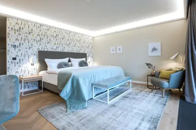Ein Bett oder Betten in einem Zimmer der Unterkunft Gut Kump Gastronomie und Hotel