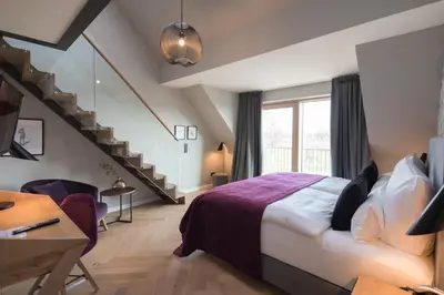 Ein Bett oder Betten in einem Zimmer der Unterkunft Gut Kump Gastronomie und Hotel