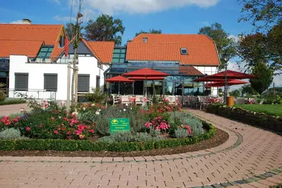 Ein Garten an der Unterkunft Gut Kump Gastronomie und Hotel