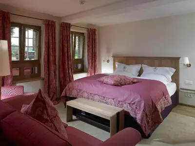 Ein Bett oder Betten in einem Zimmer der Unterkunft Gut Kump Gastronomie und Hotel