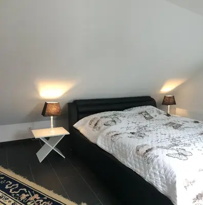 Ein Bett oder Betten in einem Zimmer der Unterkunft Haus Kummer