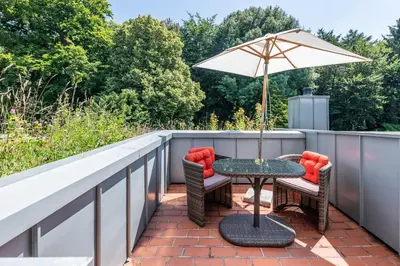 Ein Balkon oder eine Terrasse in der Unterkunft Apartment Essen- Bredeney