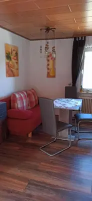 Ein Sitzbereich in der Unterkunft Ferienwohnung mit Terrasse für 1-4 Personen