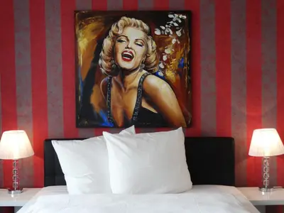 Ein Bett oder Betten in einem Zimmer der Unterkunft Hotel Stay