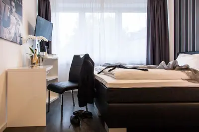 Ein Bett oder Betten in einem Zimmer der Unterkunft Hotel Stay