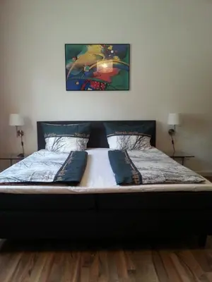 Ein Bett oder Betten in einem Zimmer der Unterkunft Lorenz Apartment