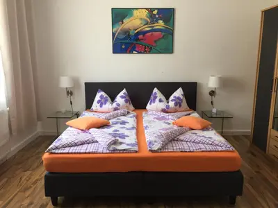 Ein Bett oder Betten in einem Zimmer der Unterkunft Lorenz Apartment
