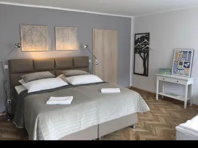 Ein Bett oder Betten in einem Zimmer der Unterkunft TM Suites