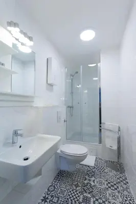 Ein Badezimmer in der Unterkunft TM Suites