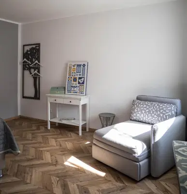 Ein Sitzbereich in der Unterkunft TM Suites
