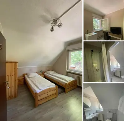Ein Bett oder Betten in einem Zimmer der Unterkunft Hotel Haus Schürmann