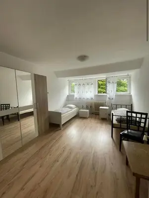 Ein Sitzbereich in der Unterkunft Hotel Haus Schürmann