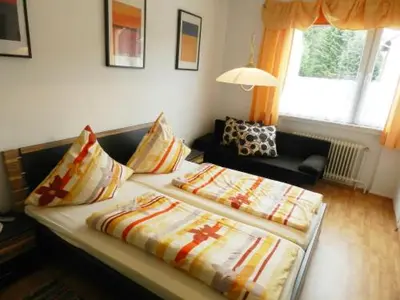 Ein Bett oder Betten in einem Zimmer der Unterkunft Hotel In der Meile