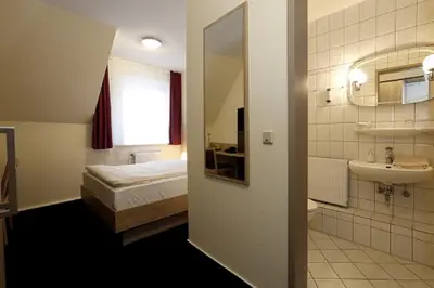 Ein Badezimmer in der Unterkunft Hotel Stadt Kamen