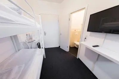 Ein Bett oder Betten in einem Zimmer der Unterkunft Berolina Haus