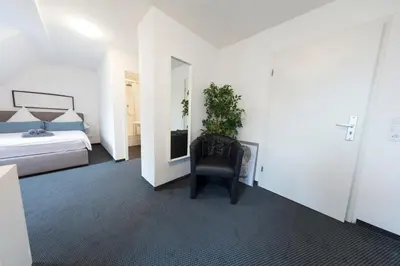 Ein Bett oder Betten in einem Zimmer der Unterkunft Berolina Haus