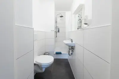 Ein Badezimmer in der Unterkunft Berolina Haus