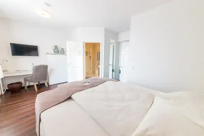 Ein Bett oder Betten in einem Zimmer der Unterkunft Landhotel Alte Töpferei