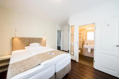 Ein Bett oder Betten in einem Zimmer der Unterkunft Landhotel Alte Töpferei