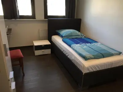 Ein Bett oder Betten in einem Zimmer der Unterkunft Hotel Restaurant Kroatia