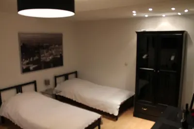 Ein Bett oder Betten in einem Zimmer der Unterkunft Fair Trade Apartment