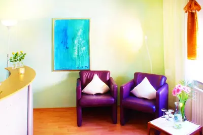 Ein Sitzbereich in der Unterkunft Kessenbrock Appartements