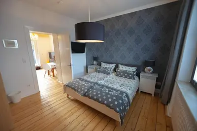 Ein Bett oder Betten in einem Zimmer der Unterkunft Apartmenthaus Lorbach