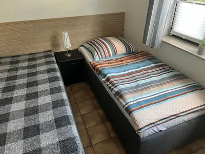 Ein Bett oder Betten in einem Zimmer der Unterkunft Ferienwohnung Blankenstein
