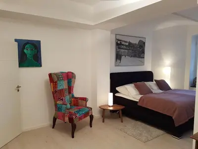 Ein Bett oder Betten in einem Zimmer der Unterkunft Business Apartment Briller Viertel