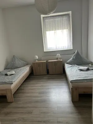 Ein Bett oder Betten in einem Zimmer der Unterkunft Ferienwohnung