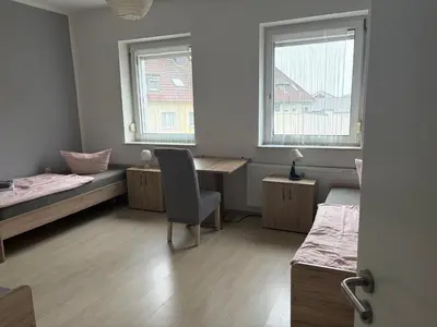 Ein Bett oder Betten in einem Zimmer der Unterkunft Ferienwohnung