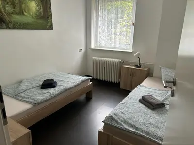 Ein Bett oder Betten in einem Zimmer der Unterkunft Ferienwohnung