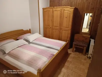 Ein Bett oder Betten in einem Zimmer der Unterkunft Haus Nähe Flughafen und Messe