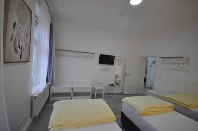 Ein Bett oder Betten in einem Zimmer der Unterkunft Apartment Dusseldorf-City